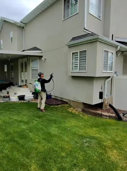 Perimeter pest treatment along a home's foundation by Bliss Pest Services, Salt Lake City, UT